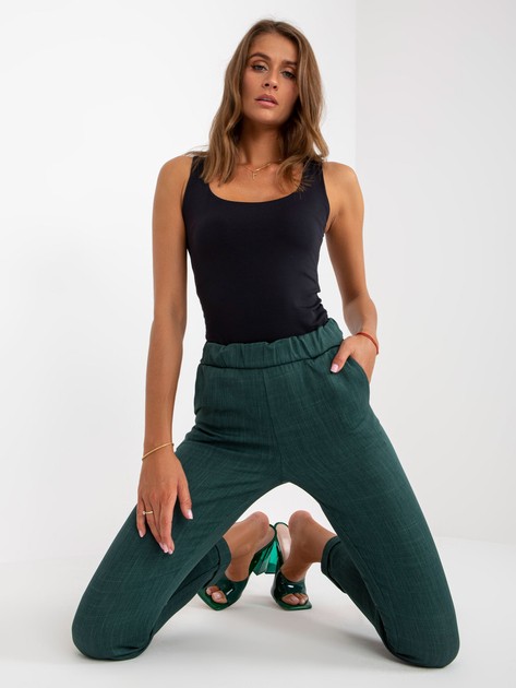 Dark green elegant pants made of fabric